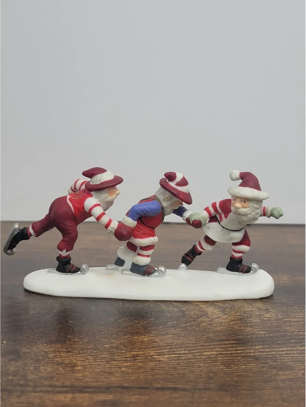Vintage Department 56 Ceramic Figurine of Three Elves Ice Skaters